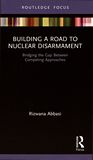 Building a road to nuclear disarmament : bridging the gap between competing approaches /