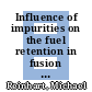 Influence of impurities on the fuel retention in fusion reactors /