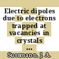 Electric dipoles due to electrons trapped at vacancies in crystals and their contribution to dielectric loss /